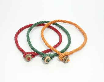 Handmade Kumihimo Braided Bracelet made of Wax Cord and Coconut Bead closure