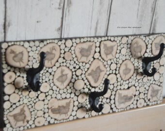 Coat rack hook rack handmade from many wooden discs with three hooks