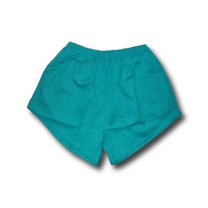 Pode incluir: Shorts esportivos turquesa com c&oacute;s el&aacute;stico.