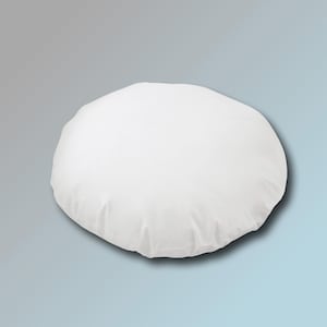 May include: A white round pillow with a smooth, soft surface.