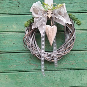 Door wreath all year round with wooden heart