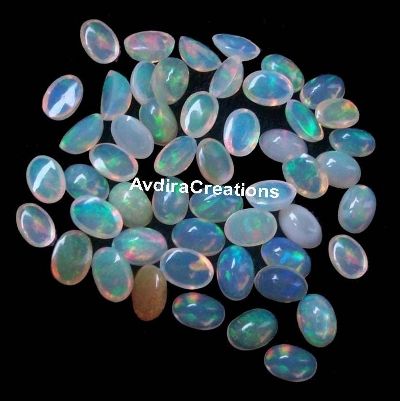 AAA Welo Ethiopian Multi Fire Opal Oval Cabochon 3x4mm To 10x14mm Natural Ethiopian Opal Oval Cabochon Calibrado Piedra preciosa suelta al por mayor