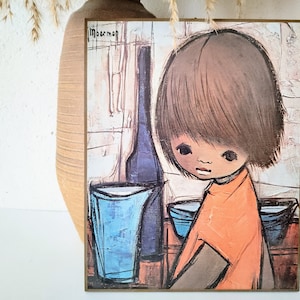 May include: Square artwork featuring a child in an orange shirt with brown hair, looking down. A blue bottle and two blue buckets are in the background. The artwork has a vintage style and the artist's name, "Moerman", is in the top left corner.
