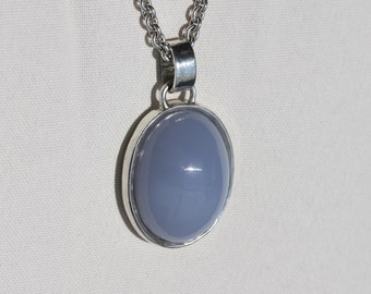 Large eye-catching and shapely blue chalcedony pendant in 925 silver with large eyelet