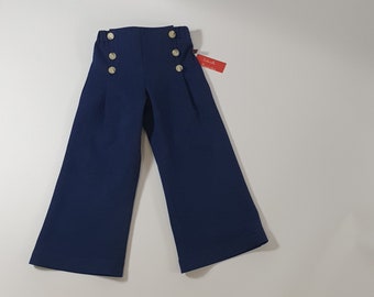 Children's jeans pants, sailor jeans made of dark blue cotton denim for boys and girls.