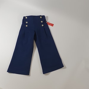 Children's jeans pants, sailor jeans made of dark blue cotton denim for boys and girls. image 1