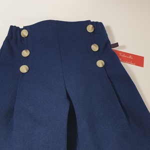 Children's jeans pants, sailor jeans made of dark blue cotton denim for boys and girls. image 4