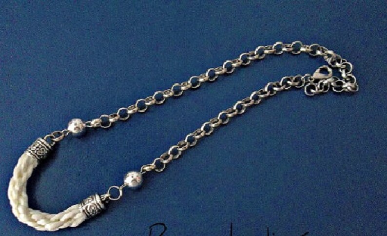 short sailor or nautical style necklace for summer. Woven white rayon necklace in Ibizan style