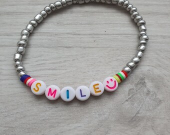SMILE bracelet with silver Rocailles name bracelet desired text