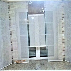 May include: White sheer window blinds with a floral pattern. The blinds are pulled down and the text "Gardinen Welt ANGELINA" is visible at the bottom of the image.