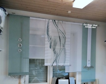 May include: White sheer curtains with a gray abstract design, labeled "Gardinen Welt ANGELINA". The curtains are hung on a window with a white trim and a light blue glass panel.