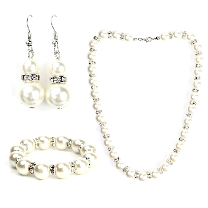 United Elegance Timeless Faux Pearl /& Crystal Jewelry Set With Necklace Drop Earrings and Bracelet