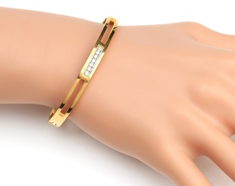 Stylish Gold Tone Bangle Bracelet with Captivating Crystals, Timeless Gift for Women, Ladies, Teens and Girls