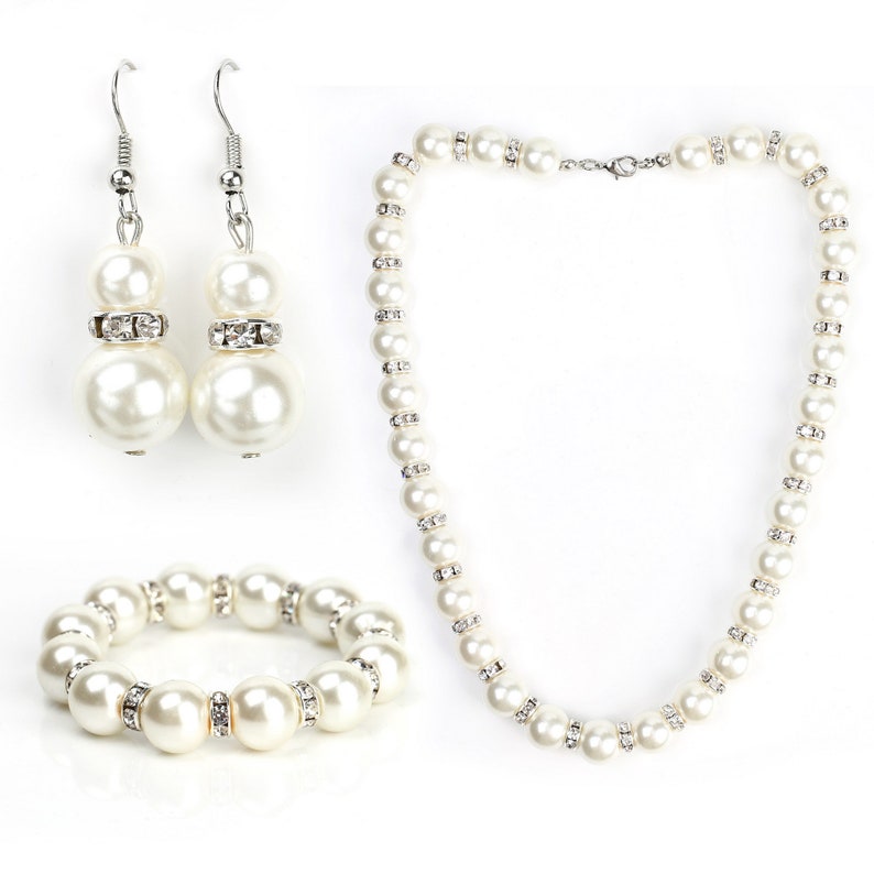 United Elegance Timeless Faux Pearl /& Crystal Jewelry Set With Necklace Drop Earrings and Bracelet