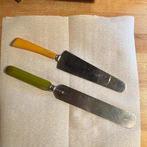vintage serving pieces with Bakelite handled