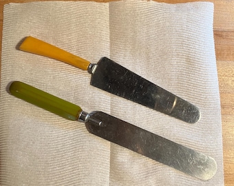 vintage serving pieces with Bakelite handled