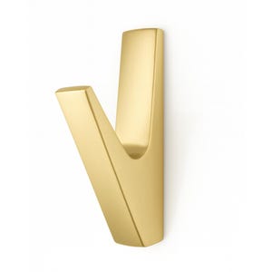 May include: A gold-coloured metal wall hook with a V-shaped design. The hook has a rectangular base and a smooth, matte finish. The hook is mounted on a white wall, showcasing its minimalist design.