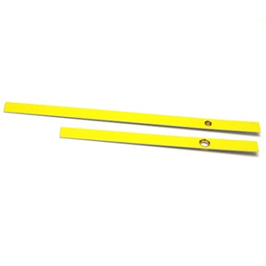 May include: Two yellow plastic strips with holes punched in them. The strips are about 1/2 inch wide and 12 inches long.