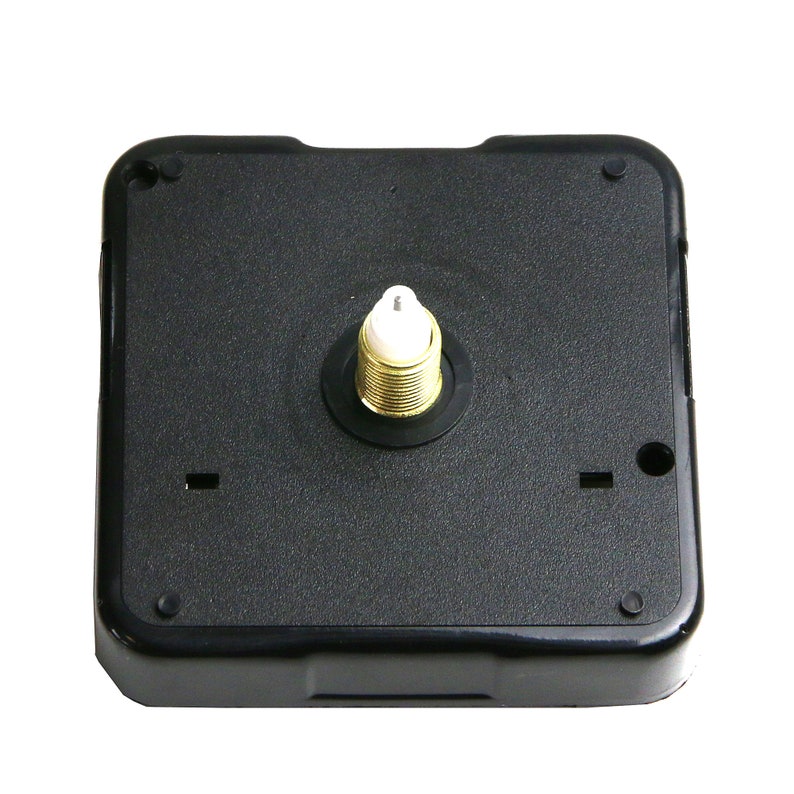 May include: A black square clock movement with a gold-colored threaded shaft and a white plastic tip. The clock mechanism has a textured surface and is designed for clock making and repair.