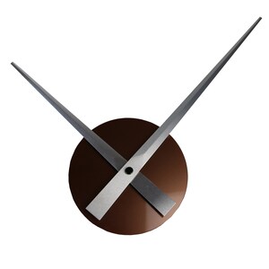 May include: A set of silver clock hands with a brown circular clock face.