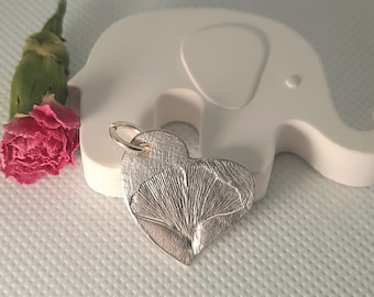 Heart pendant with embossed ginkgo leaf made of recycled fine silver