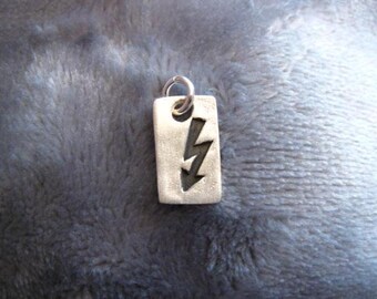 Silver pendant flash of 999 silver, patinated