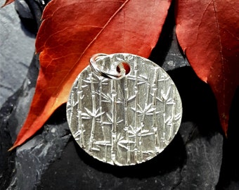 round silver pendant with bamboo structure made of 999 silver, handmade unique