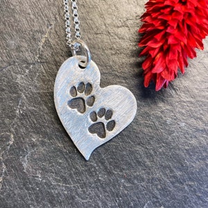 Heart pendant with stamped paw prints, 999 silver, patinated image 1