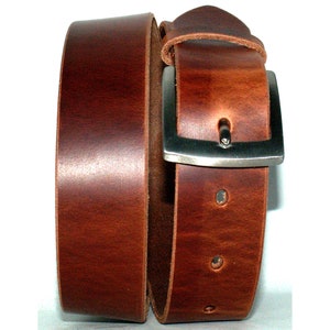 May include: A brown leather belt with a silver buckle. The belt is rolled up and the buckle is visible.