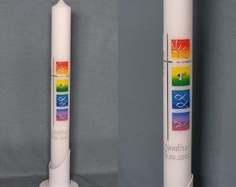 May include: White baptism candle with a silver base and a silver cross. The candle has colorful squares with religious symbols and the text "Jonathan 22.02.2022".