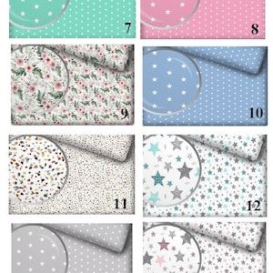 May include: A set of 10 fabric swatches with different patterns, including stars, polka dots, and floral designs. Each swatch has a number from 7 to 14.