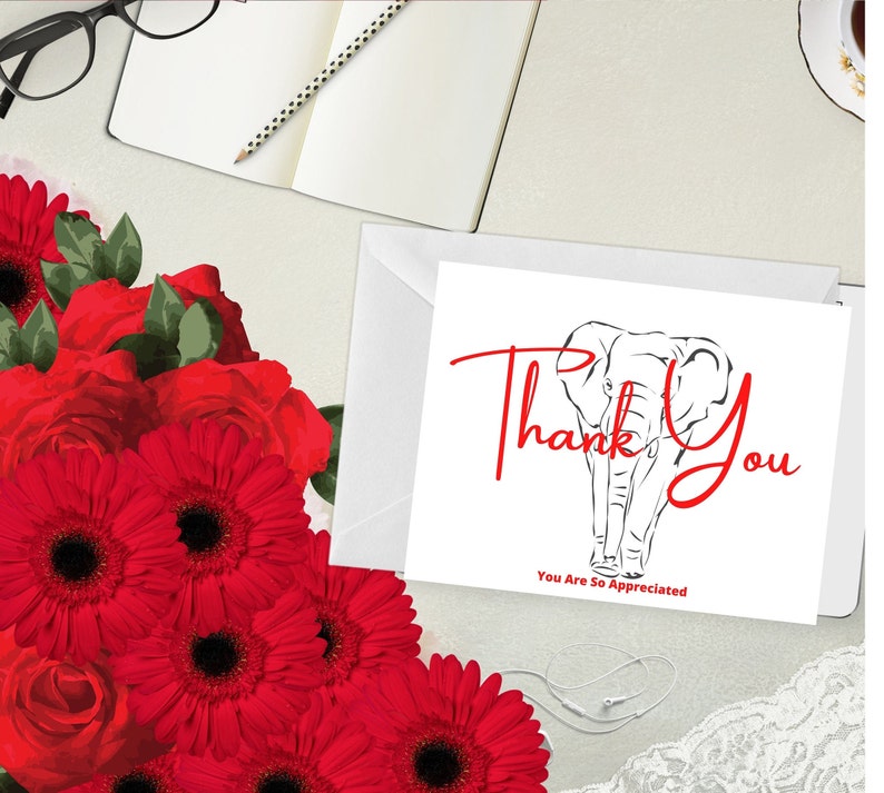 May include: A white card with red text reading "Thank You" and an elephant outline. The words "You Are So Appreciated" are below. Red flowers and a white envelope are also visible in the image.