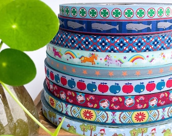 Woven ribbon with clover leaves, whales, retro flowers, unicorns, stars, Eastwind, Matryoshka doll, Miss Roth | farbenmix by Graziela | Decorative trim