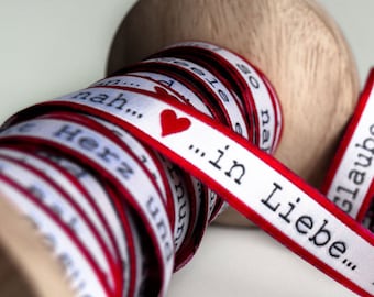 ribbon: "Glaube, Liebe und Hoffnung"