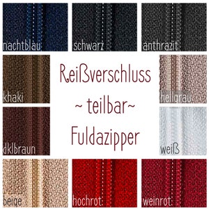 Könnte beinhalten: Eine Auswahl an Reißverschlussfarben, darunter marineblau, schwarz, anthrazit, khaki, dunkelbraun, beige, rot und burgunderrot. Der Text "Reißverschluss ~ teilbar ~ Fuldazipper" ist in der Mitte des Bildes zu sehen.
