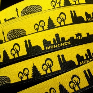 Munich skyline woven ribbon black, blue, red, turquoise with white schwarz/gelb