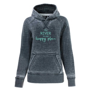 May include: A dark gray hooded sweatshirt with a distressed look. The text "the RIVER is my happy place" is printed in turquoise on the front.