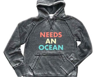 Needs An Ocean Graphic Hoodie: Unisex Vintage Wash Beach Lover Burnout Sweatshirt, Dark Grey