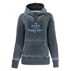 May include: A dark gray hooded sweatshirt with a distressed look. The text "the RIVER is my happy place" is printed in light blue on the front.