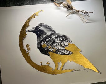 May include: A black and white drawing of a crow with gold leaf accents. The crow is perched on a branch that is partially covered in gold leaf. The background is white.