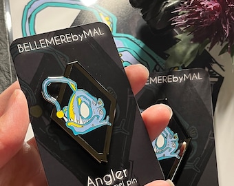 Angler enamel pin