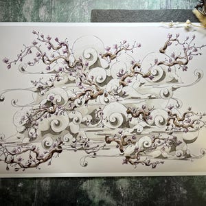 May include: An artistic print featuring a stylized illustration of a flowering tree with brown branches and purple blossoms. The tree is set against a backdrop of swirling white clouds and a light gray sky, creating a serene and elegant composition.