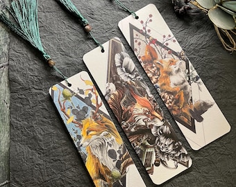 May include: Three bookmarks with green tassels. Each bookmark features a different illustration of a fox in a geometric frame. The foxes are depicted in a stylized, almost abstract style, with intricate details and vibrant colors.