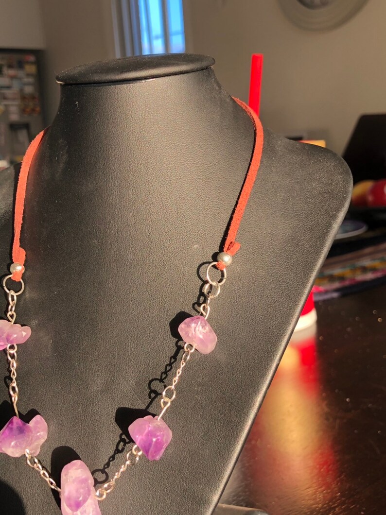 silver and leather necklace. Genuine uncut Amethyst