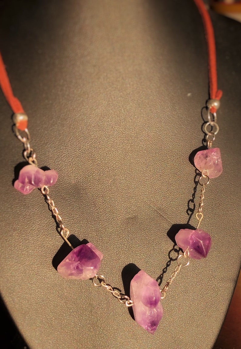 silver and leather necklace. Genuine uncut Amethyst