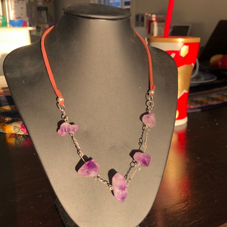 silver and leather necklace. Genuine uncut Amethyst