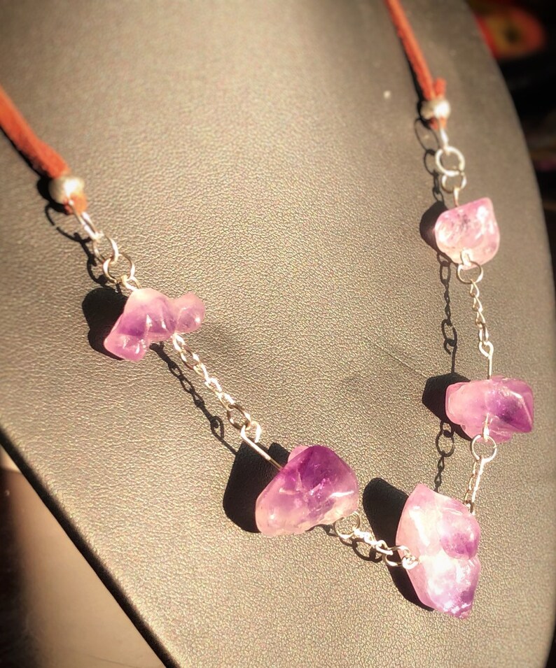 silver and leather necklace. Genuine uncut Amethyst