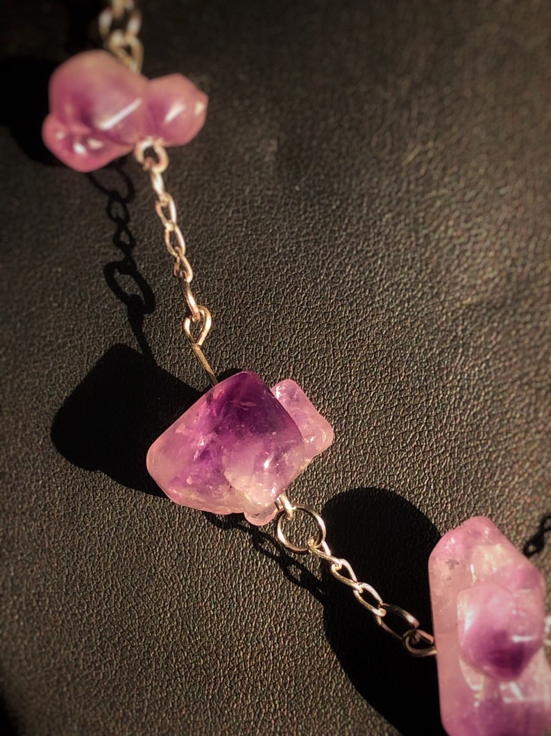 silver and leather necklace. Genuine uncut Amethyst
