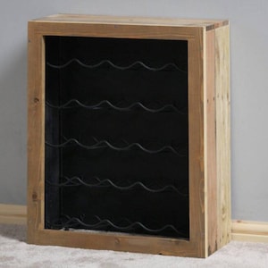 May include: A wooden wine rack with a black metal grid to hold wine bottles. The rack is made of reclaimed wood and has a rustic look.