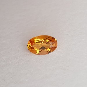 1,68 ct szlachetny topaz, naturalny, nieobrobiony, szlif owalny